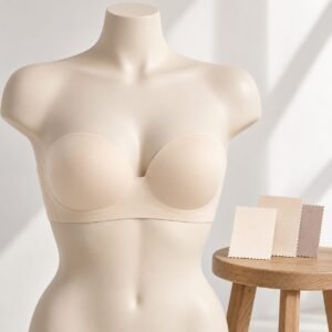 Ivory strapless moulded bandeau bra with fabric swatches, custom bra manufacturer